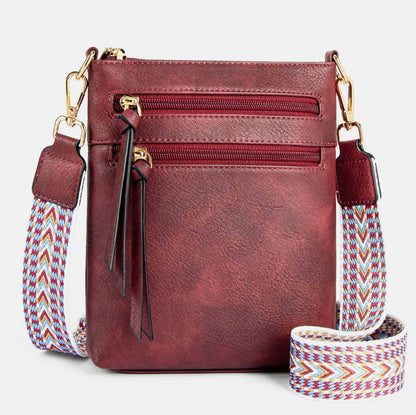 Multi-Zipper Vertical Shoulder Bag