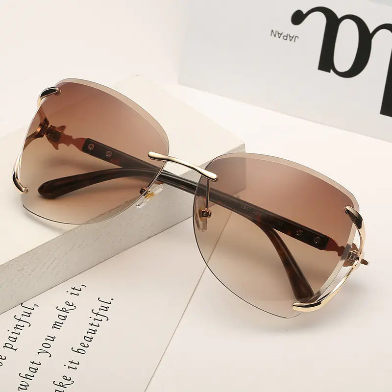 Stylish Frameless Sunglasses with Diamond Fox Head